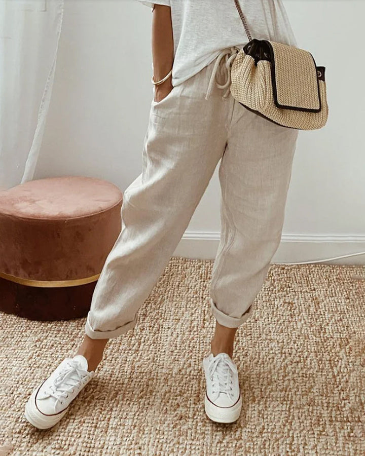 Calças de algodão casuais com bolsos e cordão