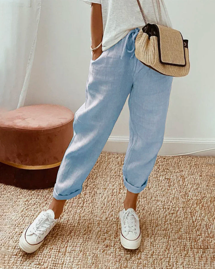 Calças de algodão casuais com bolsos e cordão