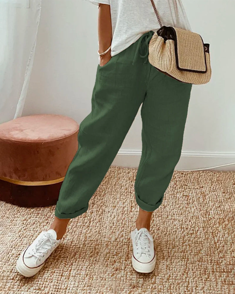 Calças de algodão casuais com bolsos e cordão